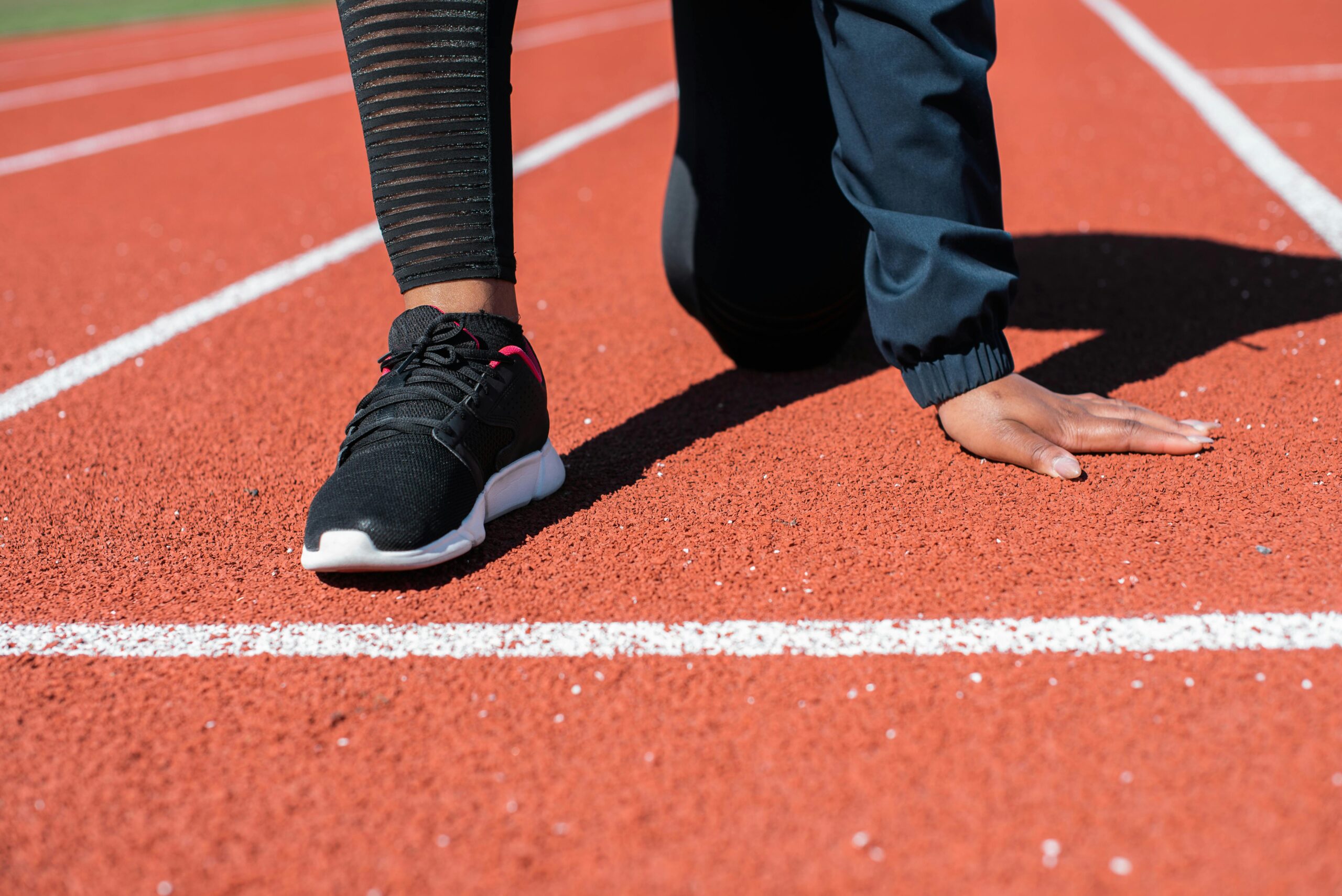 Close up of beginner running shoes on pavement