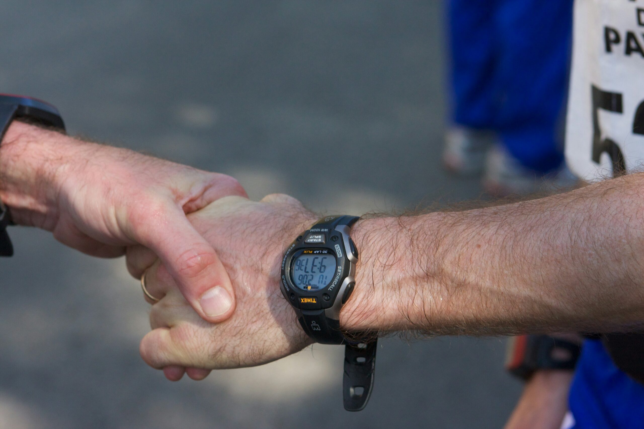 GPS running watch showing pace during half marathon training