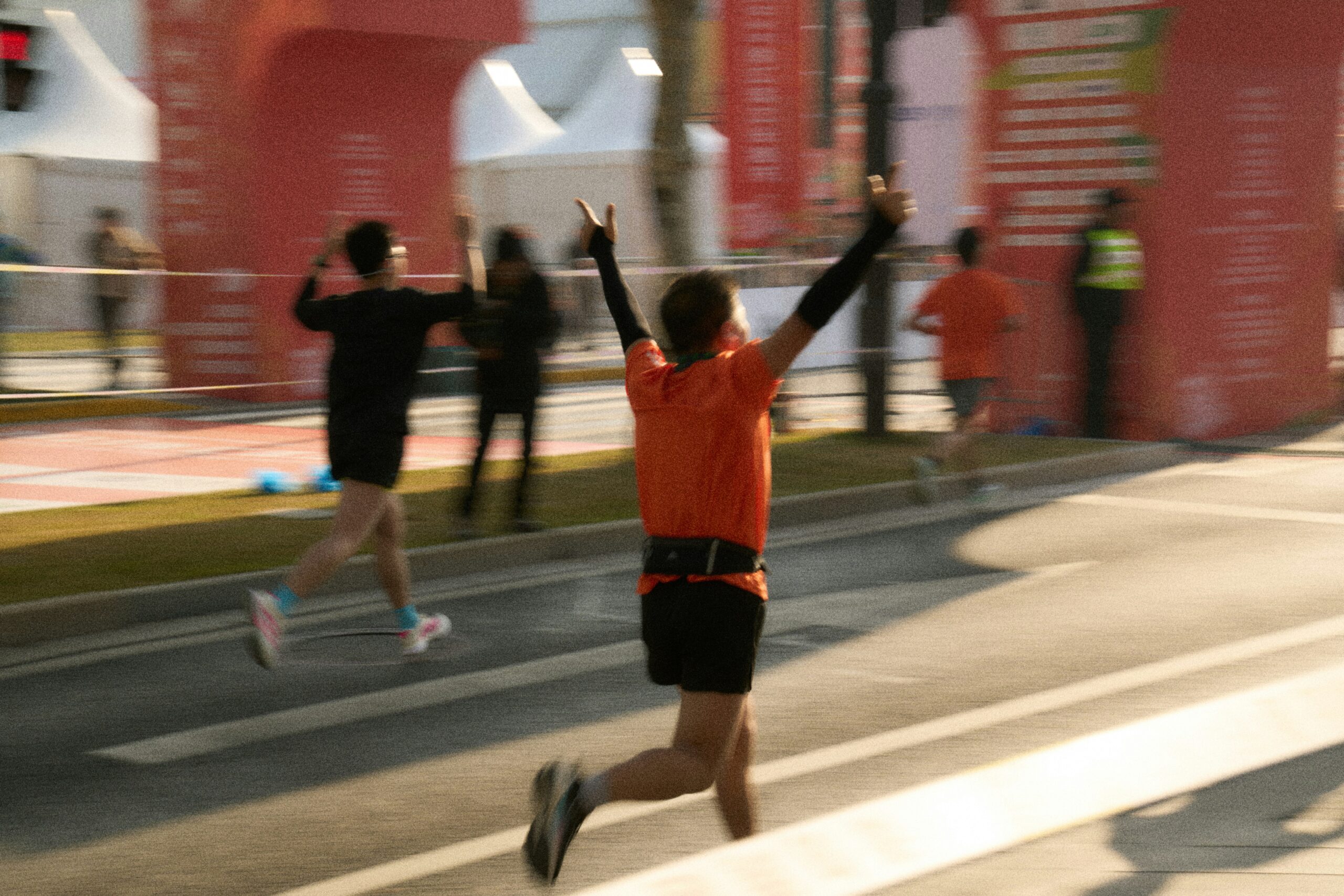 Marathon runner crossing the finish line